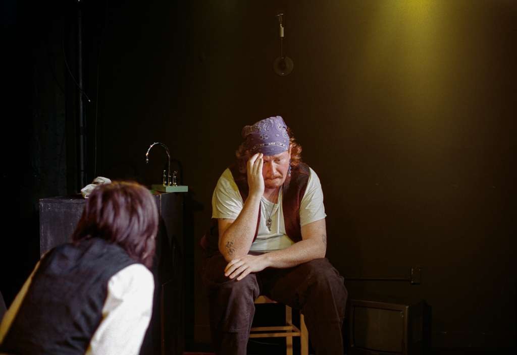 The artist, receiving notes.